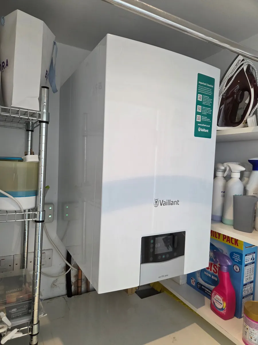 White Vaillant boiler mounted in a utility room